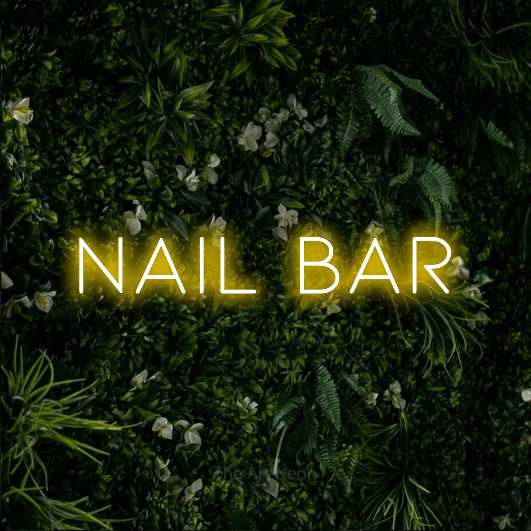 LED neon sign reading “NAIL bar”, arranged in a single line.