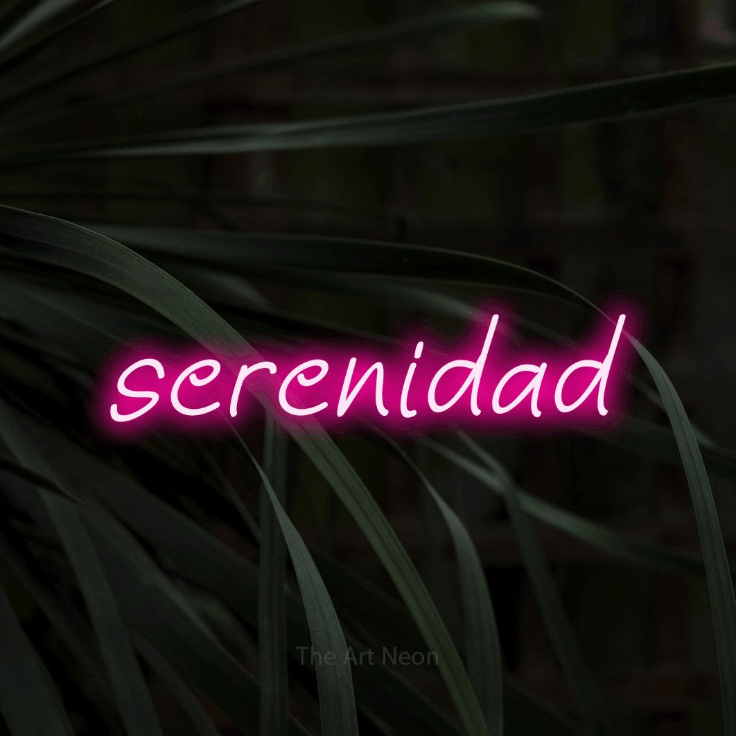 LED neon sign reading “serenidad”, arranged in a single line.