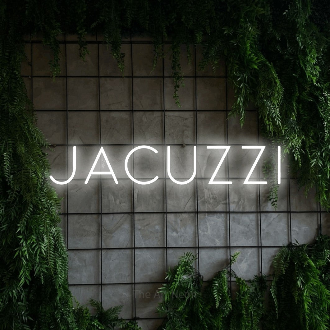 LED neon sign reading “jacuzzi”, arranged in a single line.