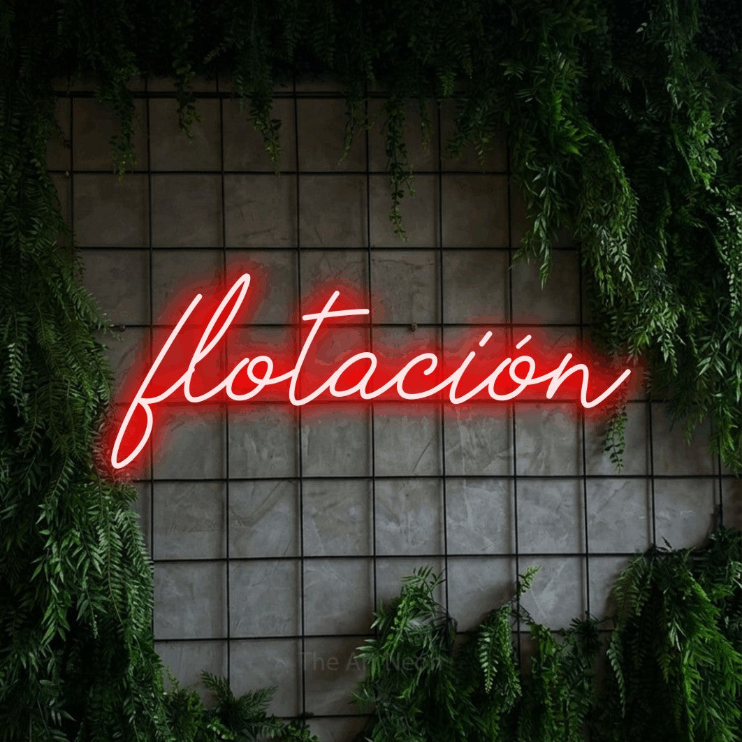 LED neon sign reading “flotación”, arranged in a single line.