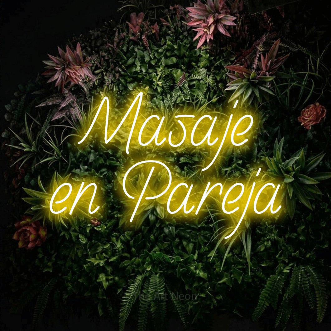 LED neon sign reading “Masaje en Pareja”, arranged in 2 lines.
