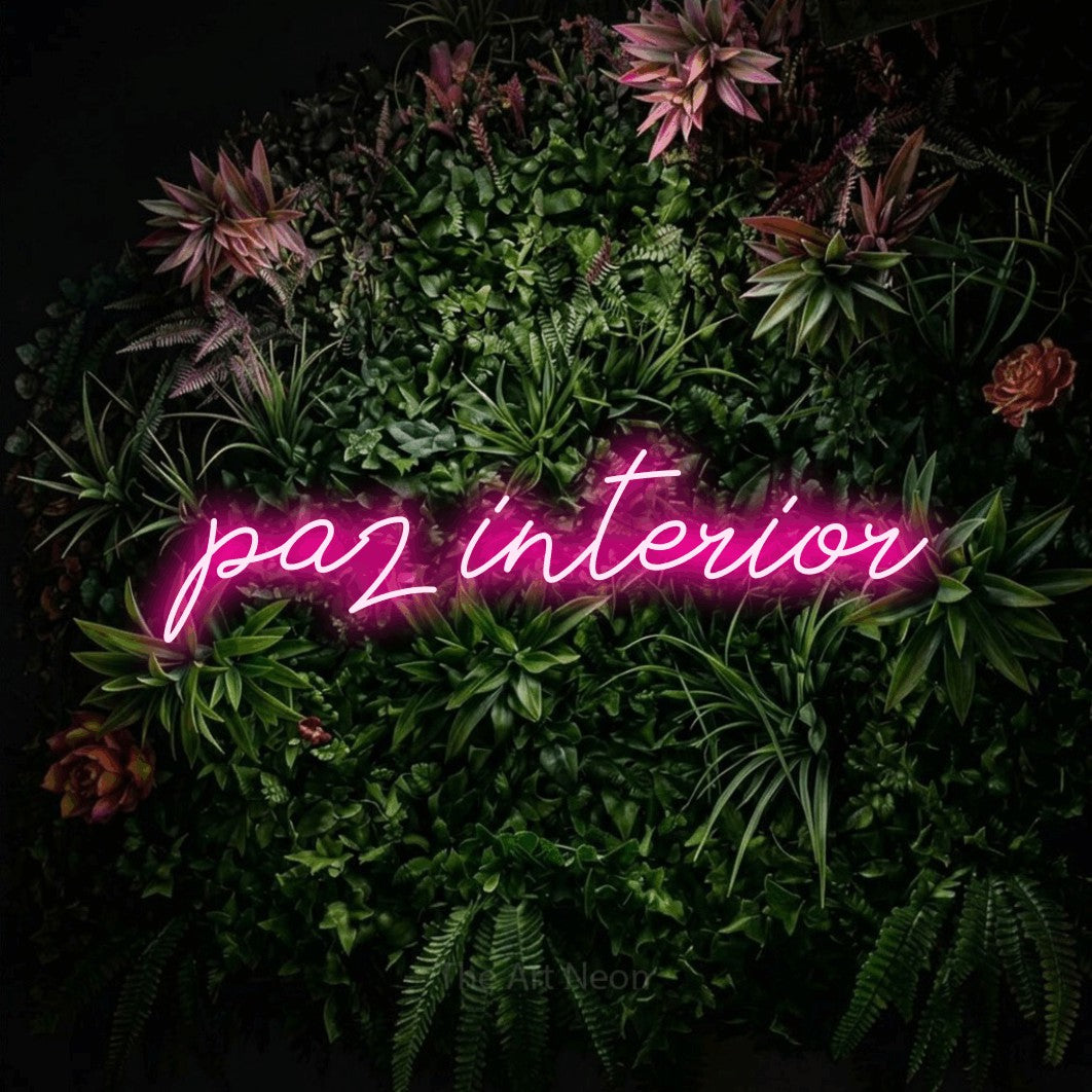 LED neon sign reading “paz interior”, arranged in a single line.