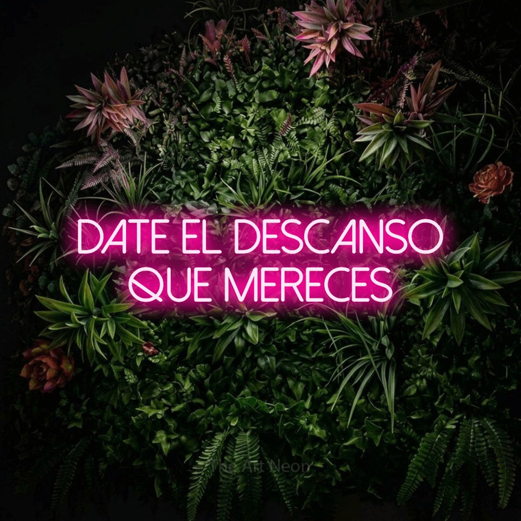LED neon sign reading “Date el Descanso que Mereces”, arranged in 2 lines.