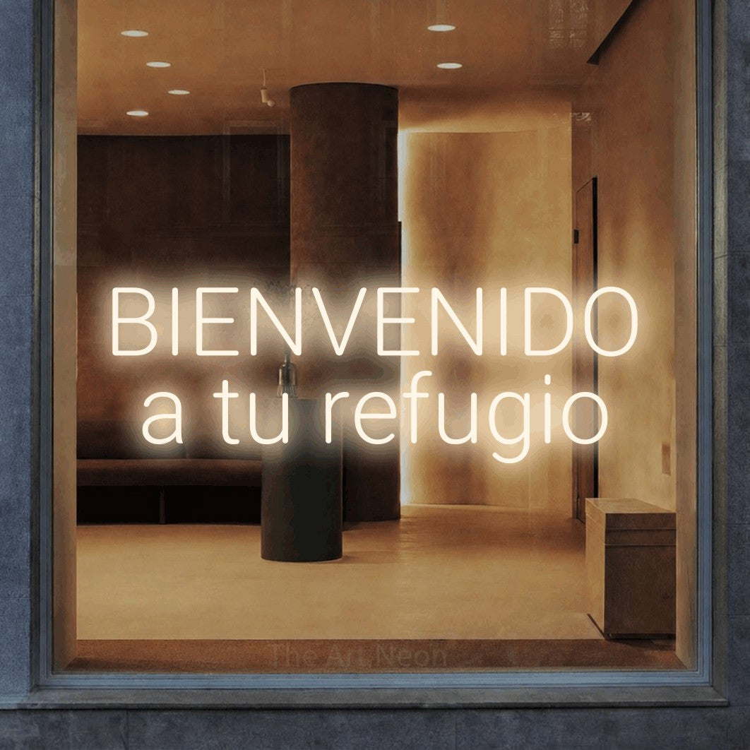 LED neon sign reading “BIENVENIDO a tu refugio”, arranged in 2 lines.