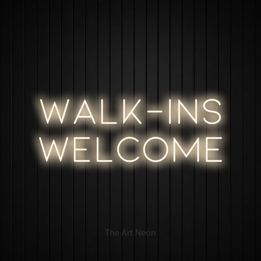 LED neon sign reading “WALK-INS welcome”, arranged in 2 lines.
