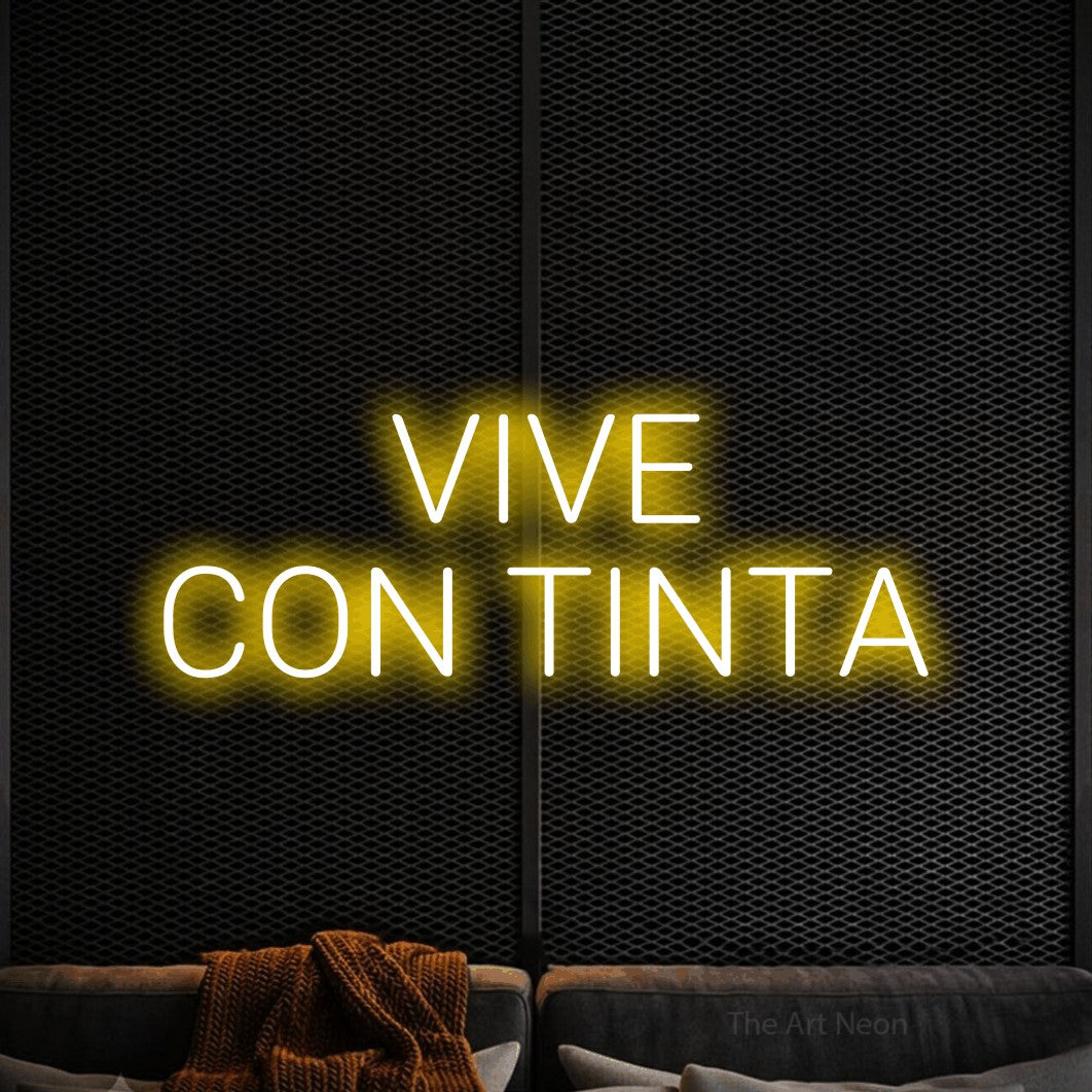 LED neon sign reading “VIVE CON TINTA”, arranged in 2 lines.