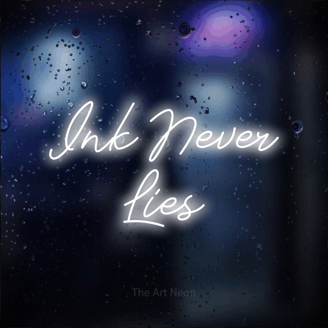LED neon sign reading “Ink Never Lies”, arranged in 2 lines.