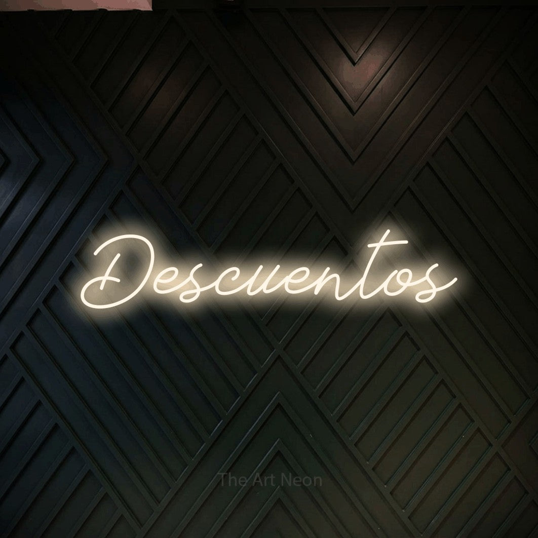 LED neon sign reading “Descuentos”, arranged in a single line.