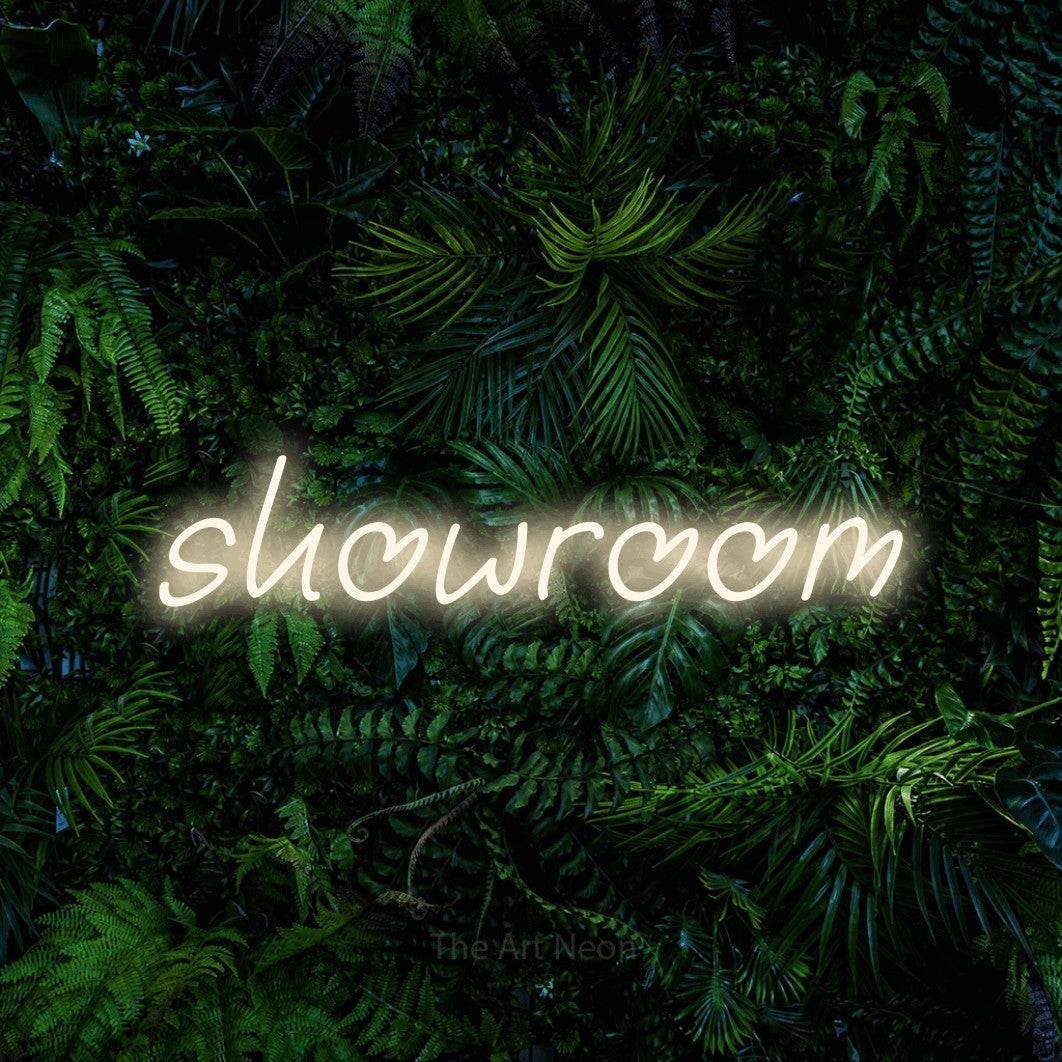 LED neon sign reading “showroom”, arranged in a single line.