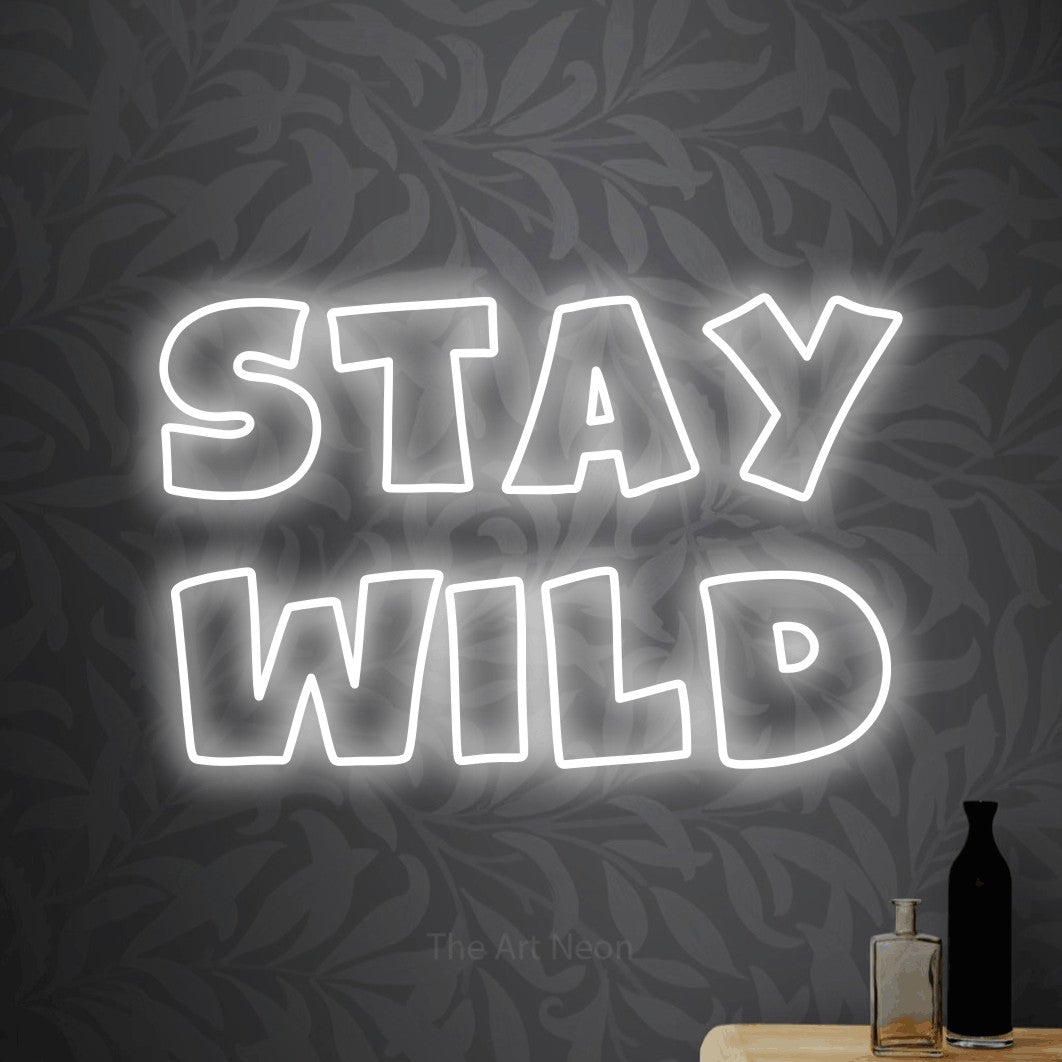 LED neon sign reading “Stay Wild”, arranged in 2 lines.