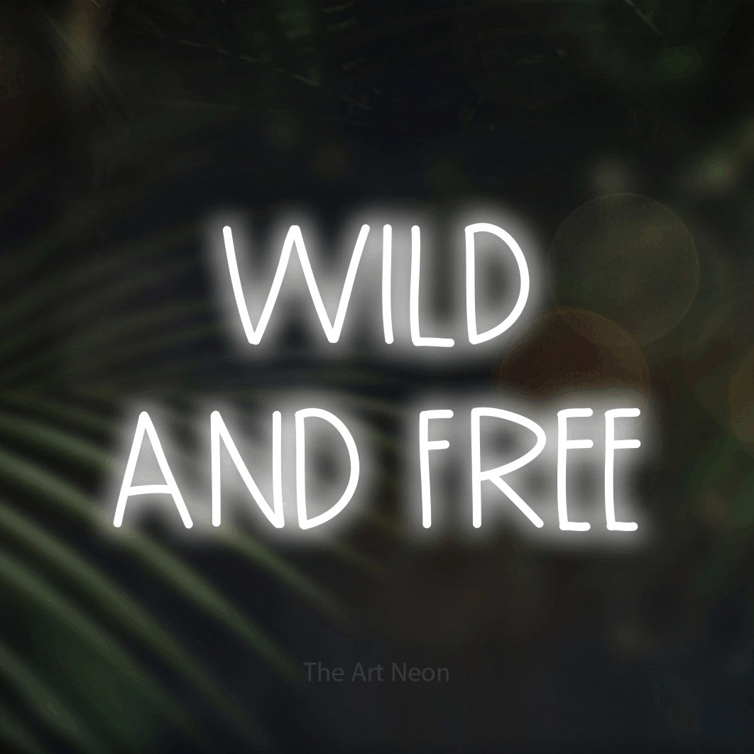 LED neon sign reading “WILD AND FREE”, arranged in 2 lines.