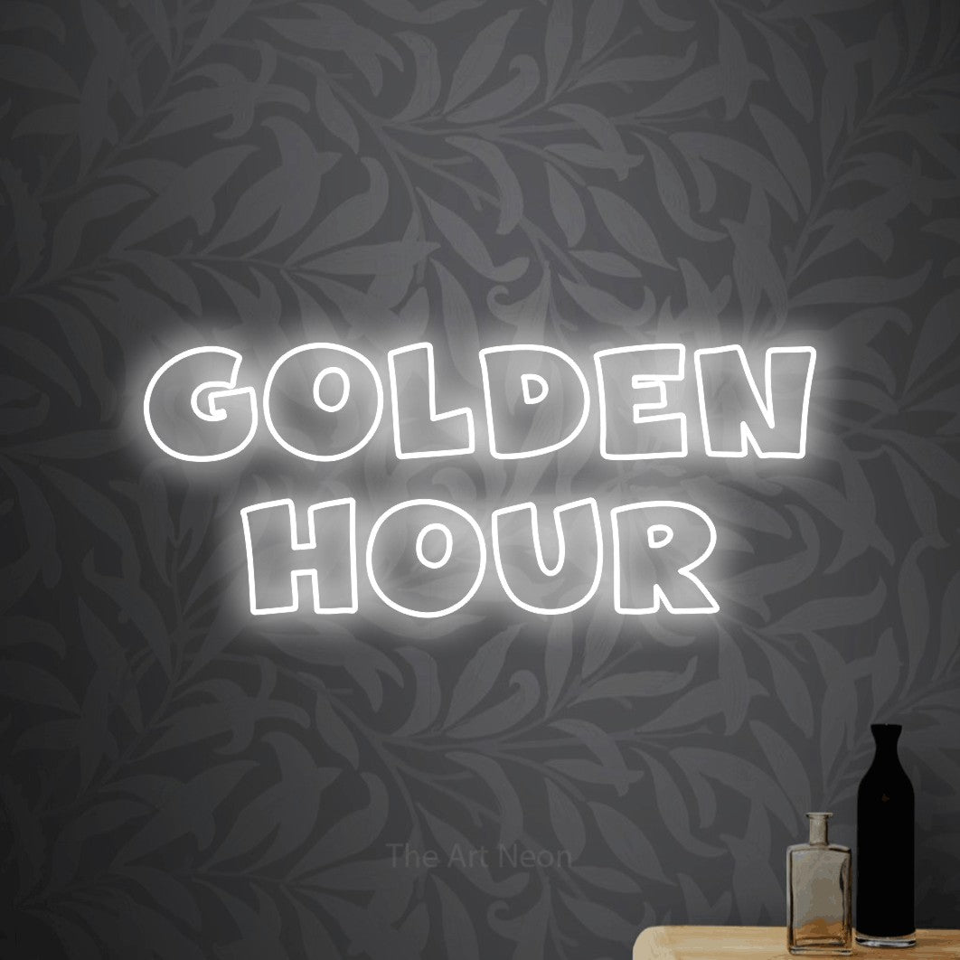 LED neon sign reading “Golden Hour”, arranged in 2 lines.