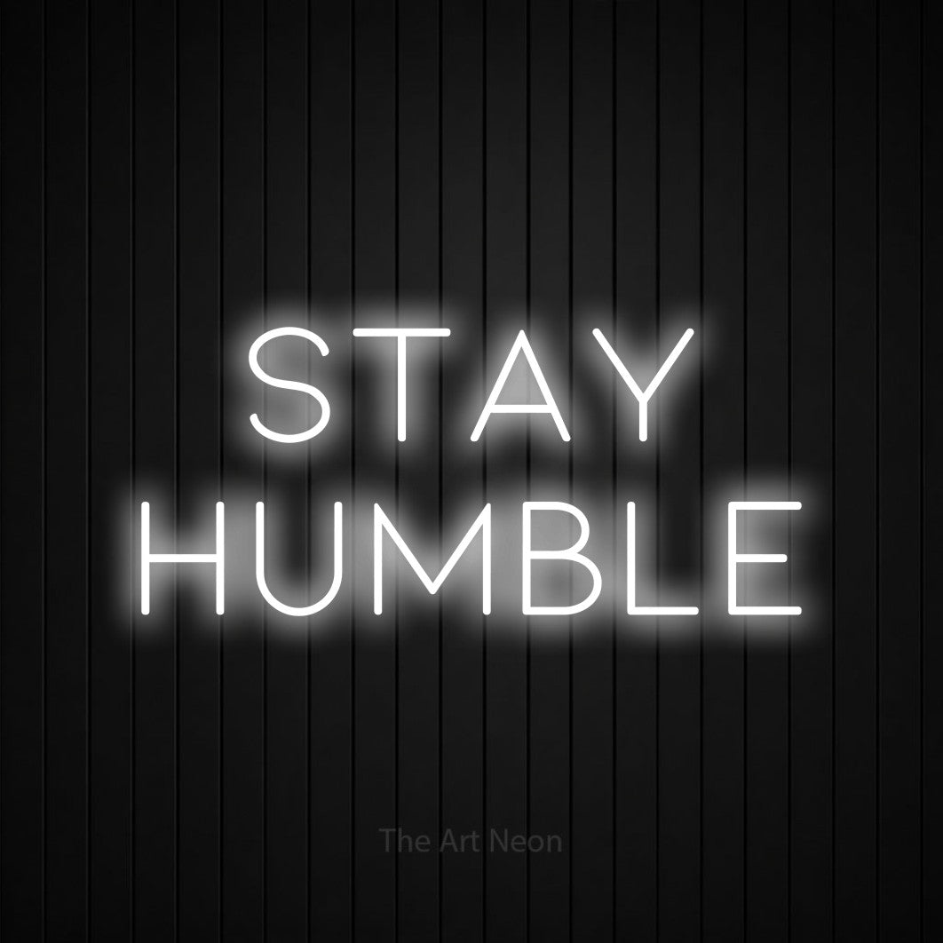 LED neon sign reading “stay HUMBLE”, arranged in 2 lines.