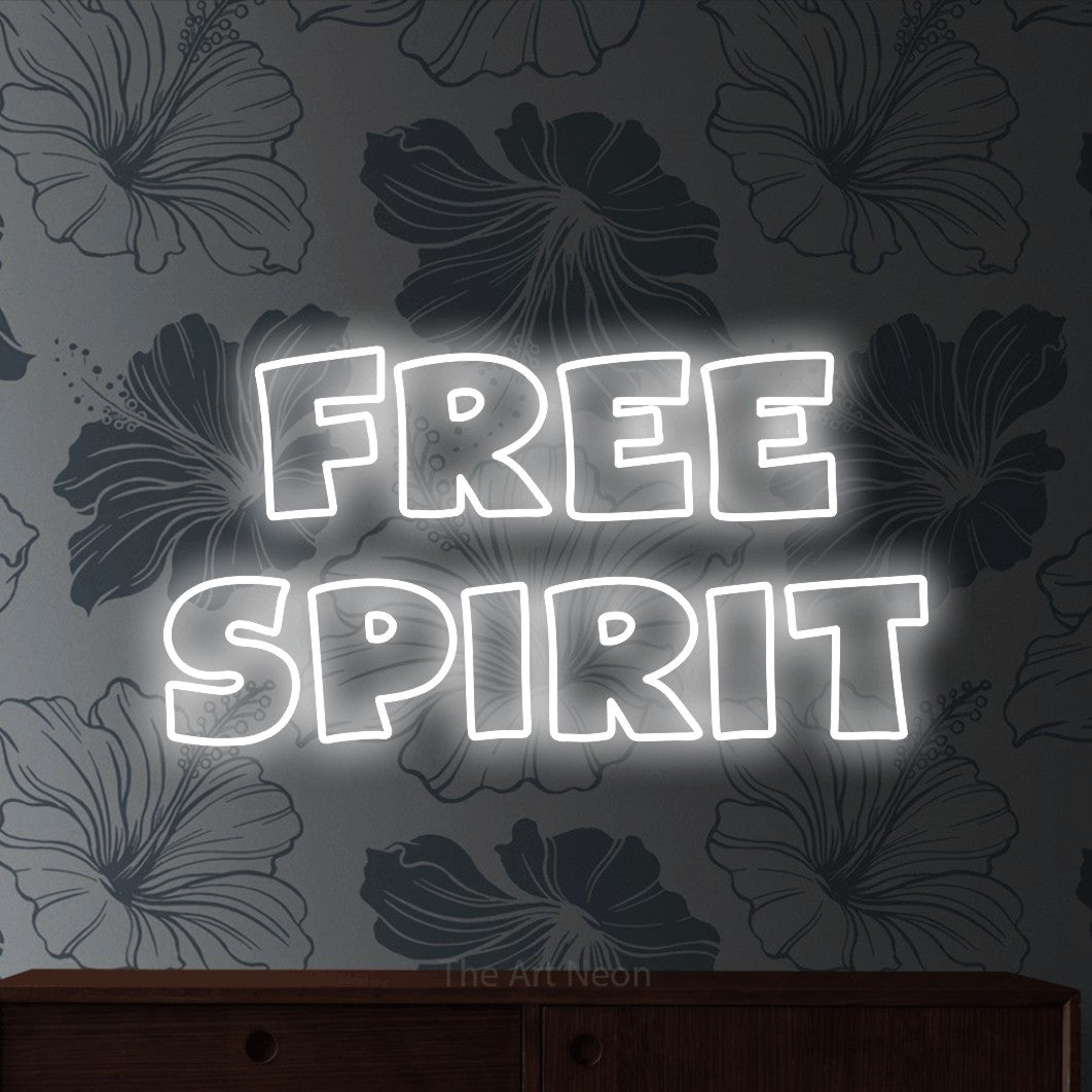 LED neon sign reading “free spirit”, arranged in 2 lines.
