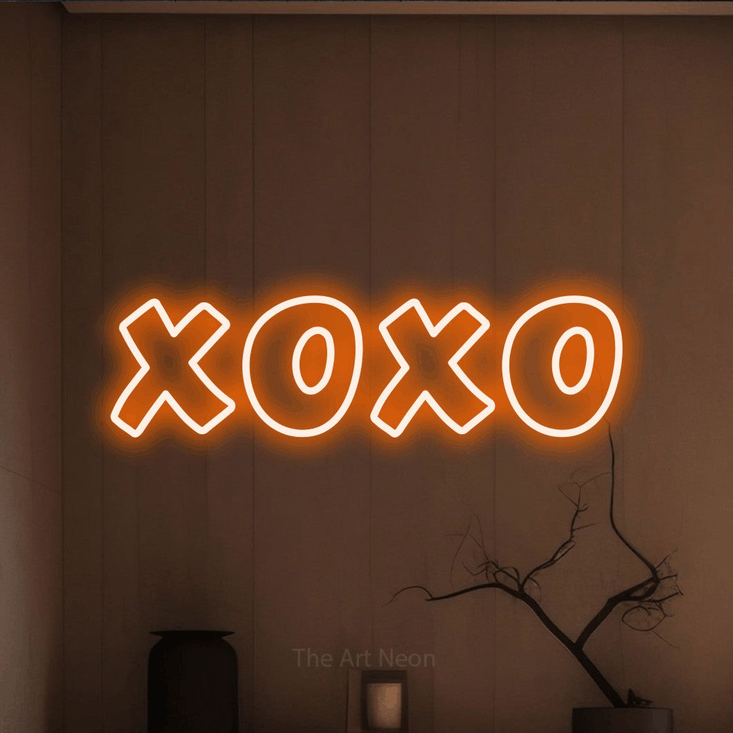 LED neon sign reading “XOXO”, arranged in a single line.