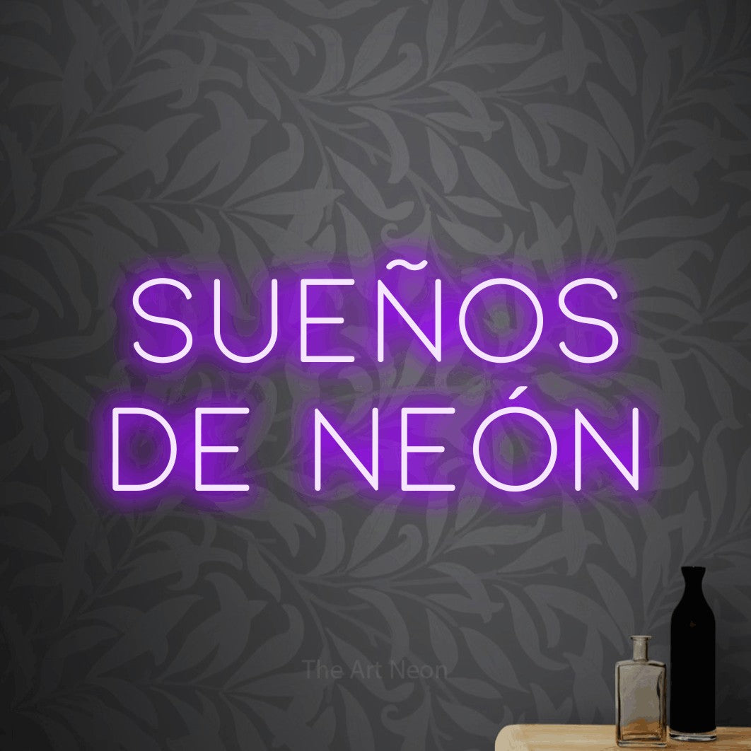 LED neon sign reading “Sueños de Neón”, arranged in 2 lines.