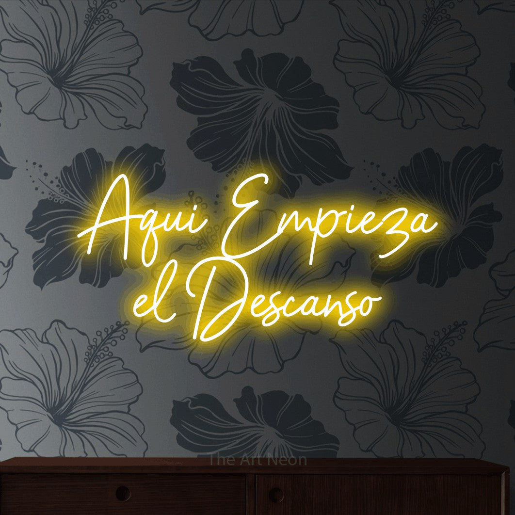 LED neon sign reading “Aquí Empieza el Descanso”, arranged in 2 lines.