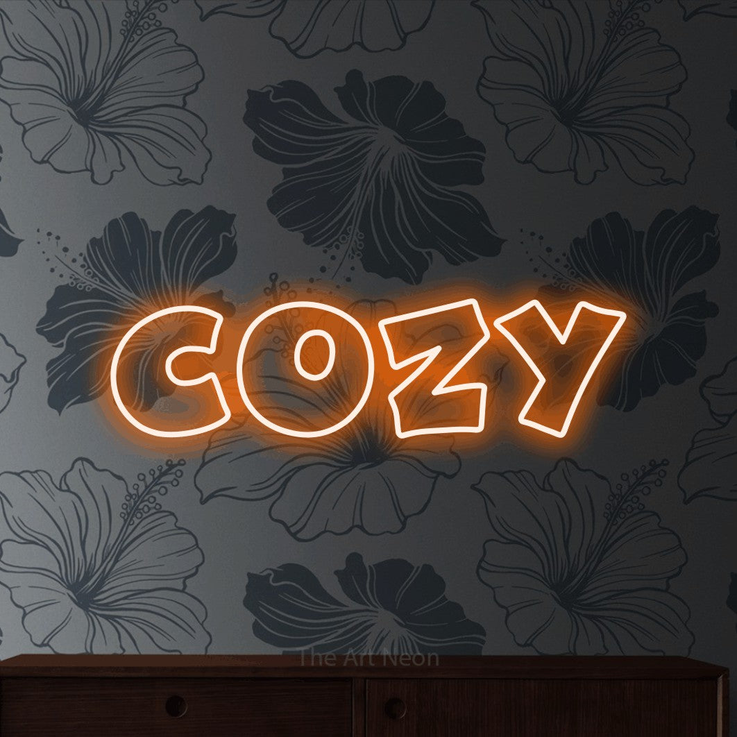 LED neon sign reading “cozy”, arranged in a single line.