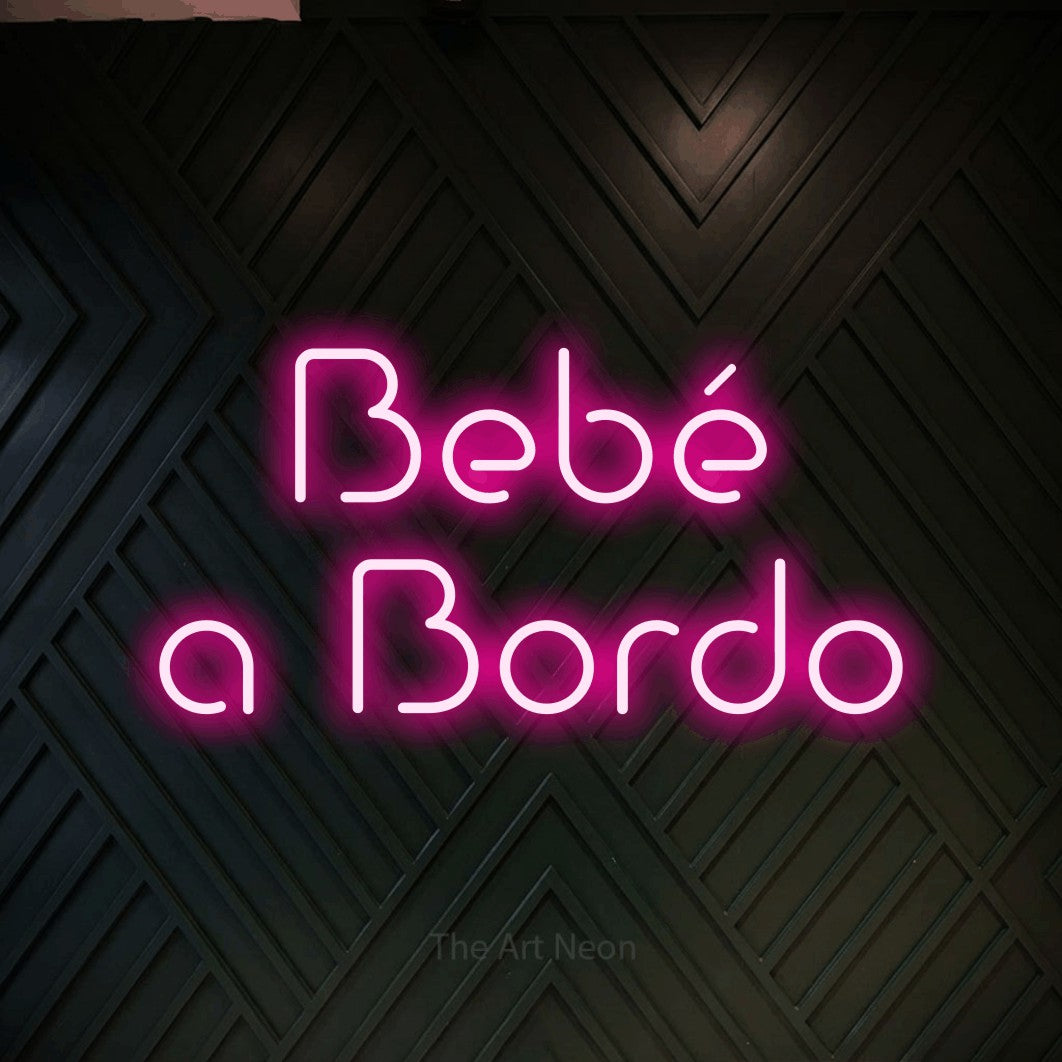 LED neon sign reading “Bebé a Bordo”, arranged in 2 lines.