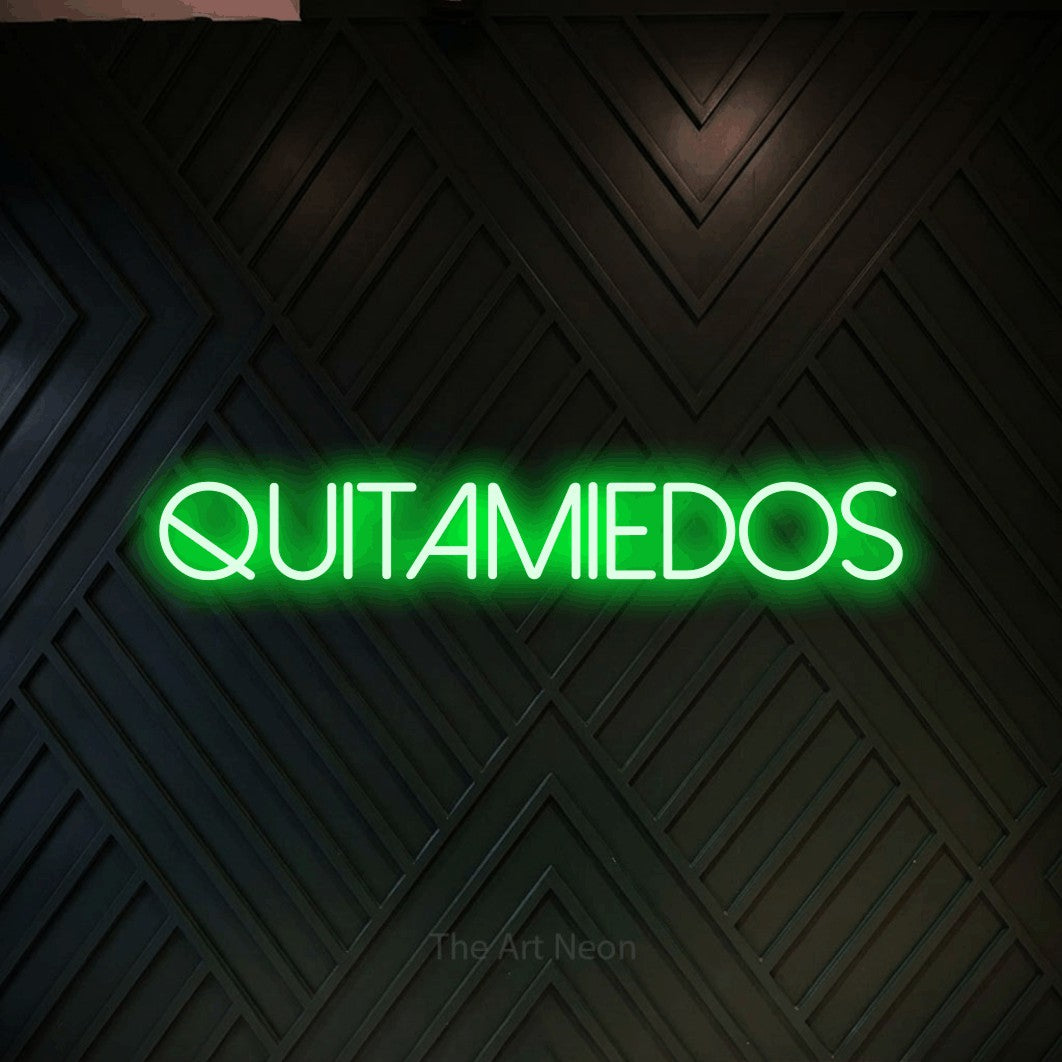LED neon sign reading “QUITAMIEDOS”, arranged in a single line.