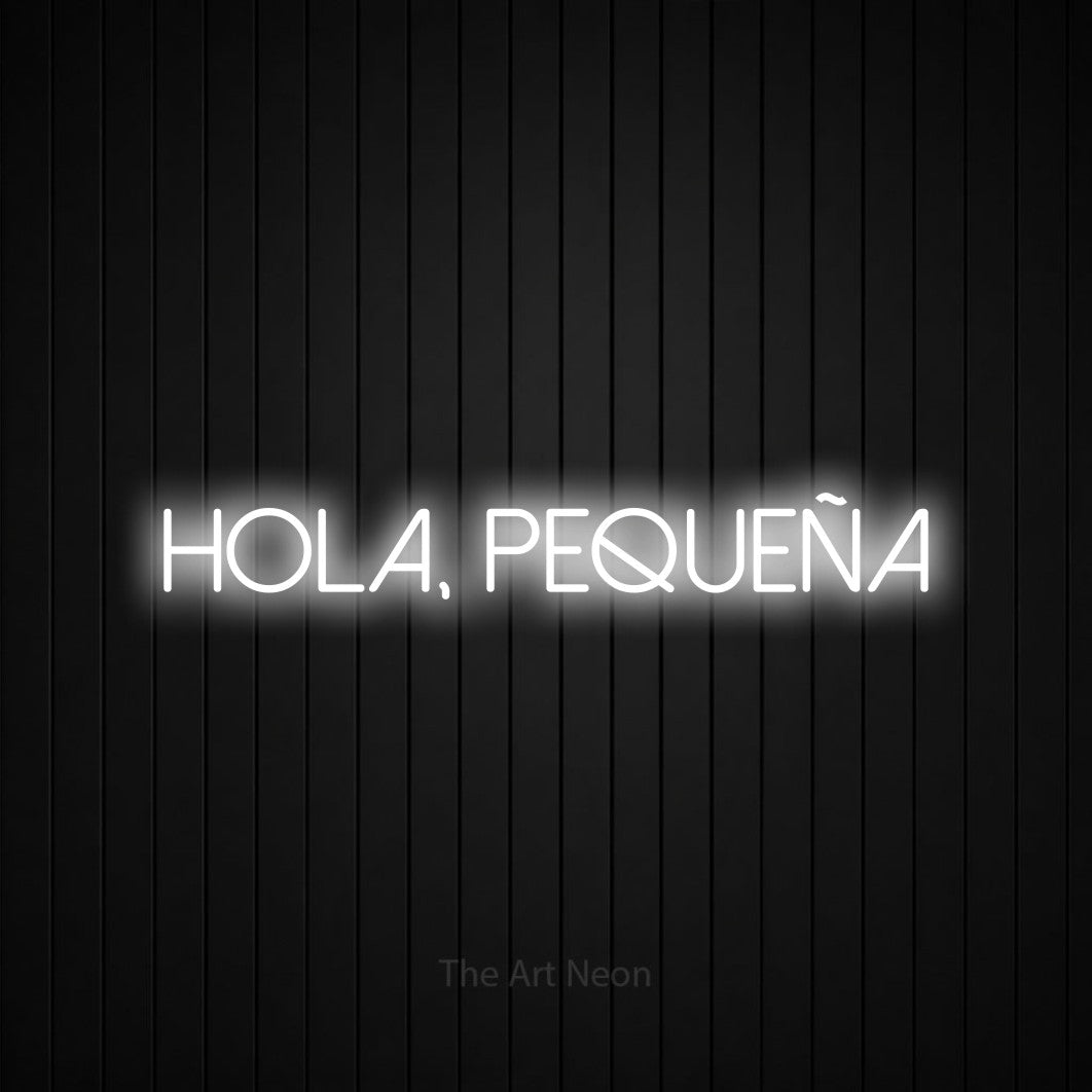 LED neon sign reading “Hola, Pequeña”, arranged in a single line.