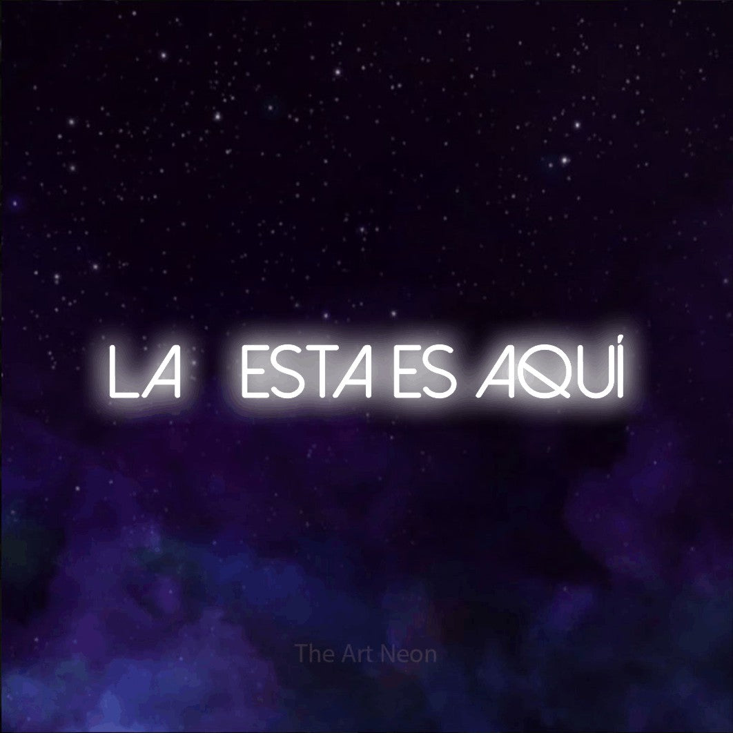 LED neon sign reading “La fiesta es aquí”, arranged in a single line.