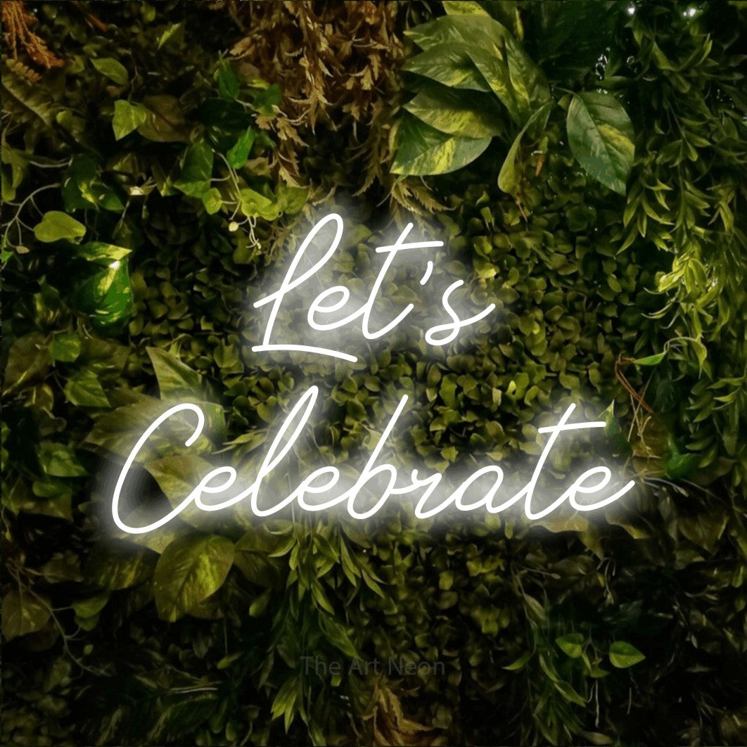 LED neon sign reading “Let's Celebrate”, arranged in 2 lines.