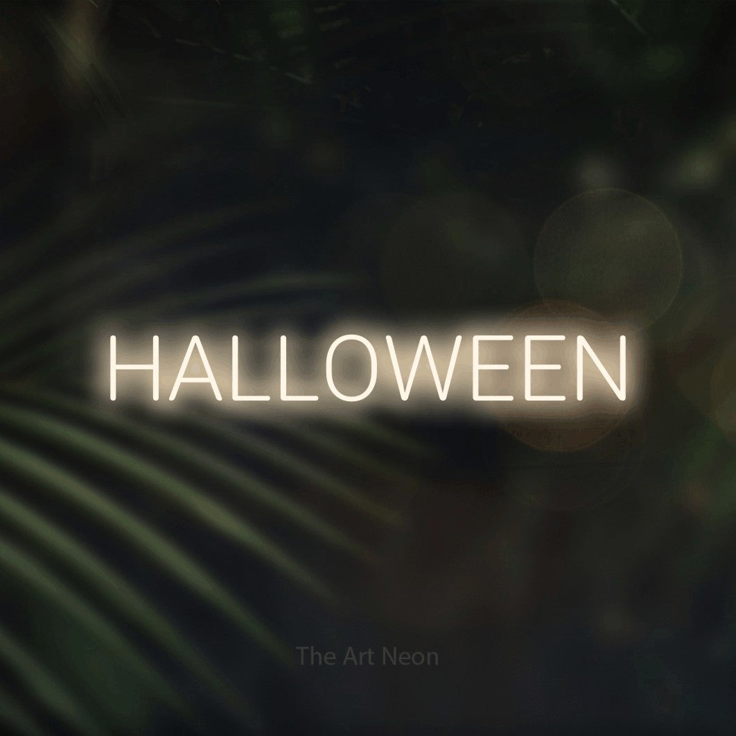 LED neon sign reading “HALLOWEEN”, arranged in a single line.