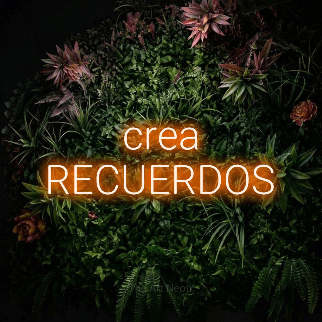 LED neon sign reading “crea RECUERDOS”, arranged in 2 lines.