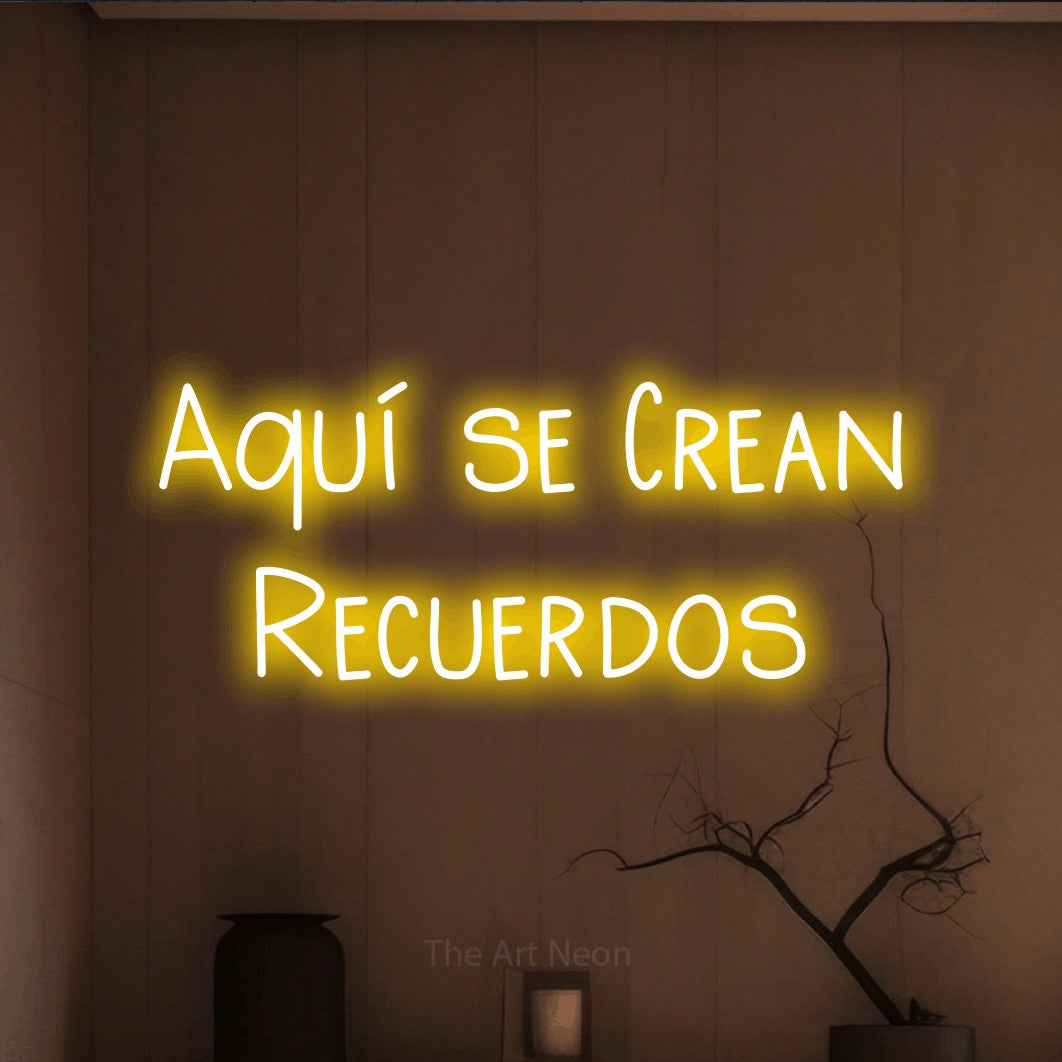 LED neon sign reading “Aquí se Crean Recuerdos”, arranged in 2 lines.
