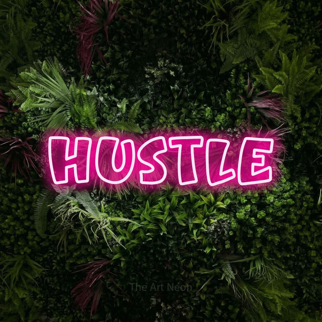 LED neon sign reading “Hustle”, arranged in a single line.