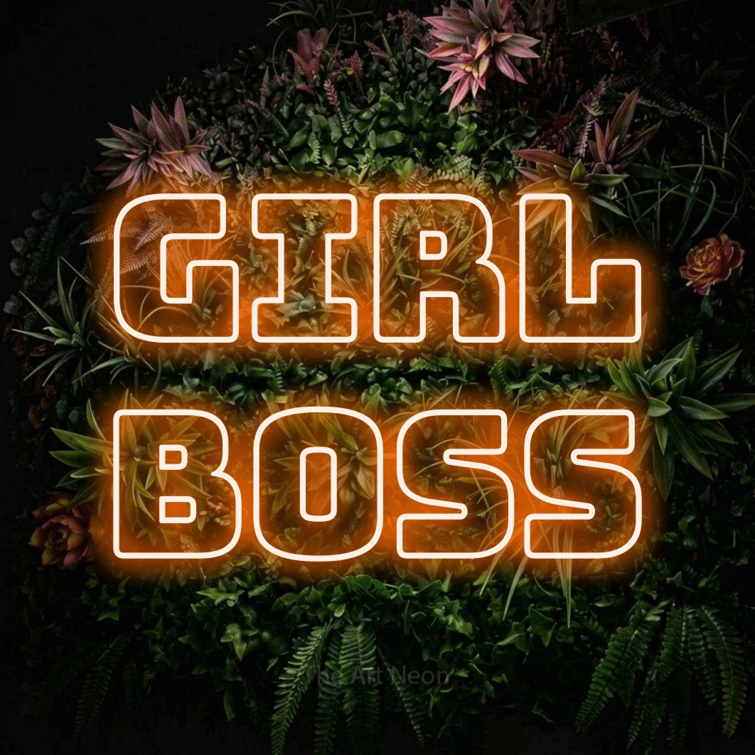 LED neon sign reading “Girl Boss”, arranged in 2 lines.