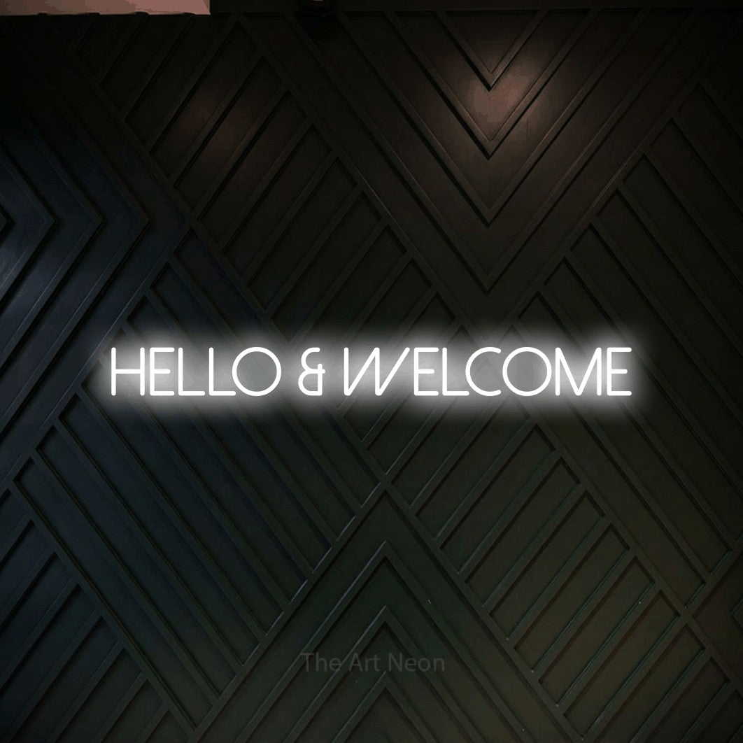 LED neon sign reading “Hello & Welcome”, arranged in a single line.