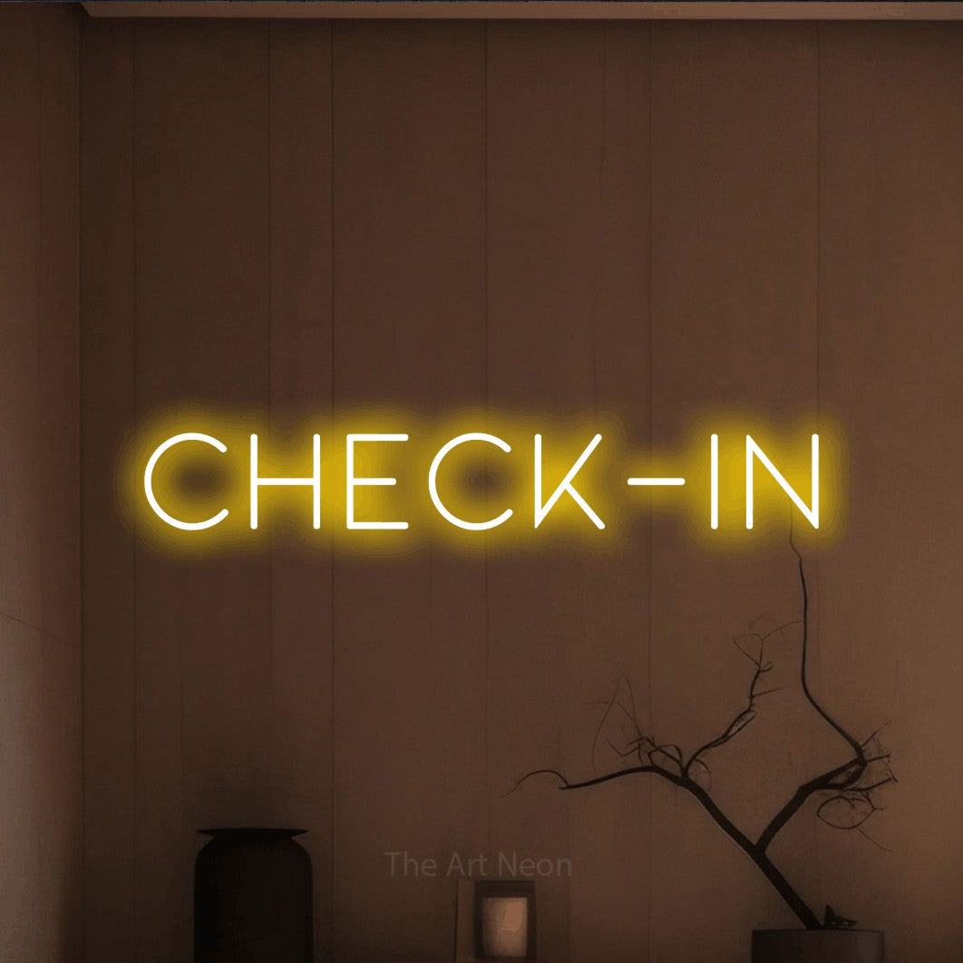 LED neon sign reading “check-in”, arranged in a single line.