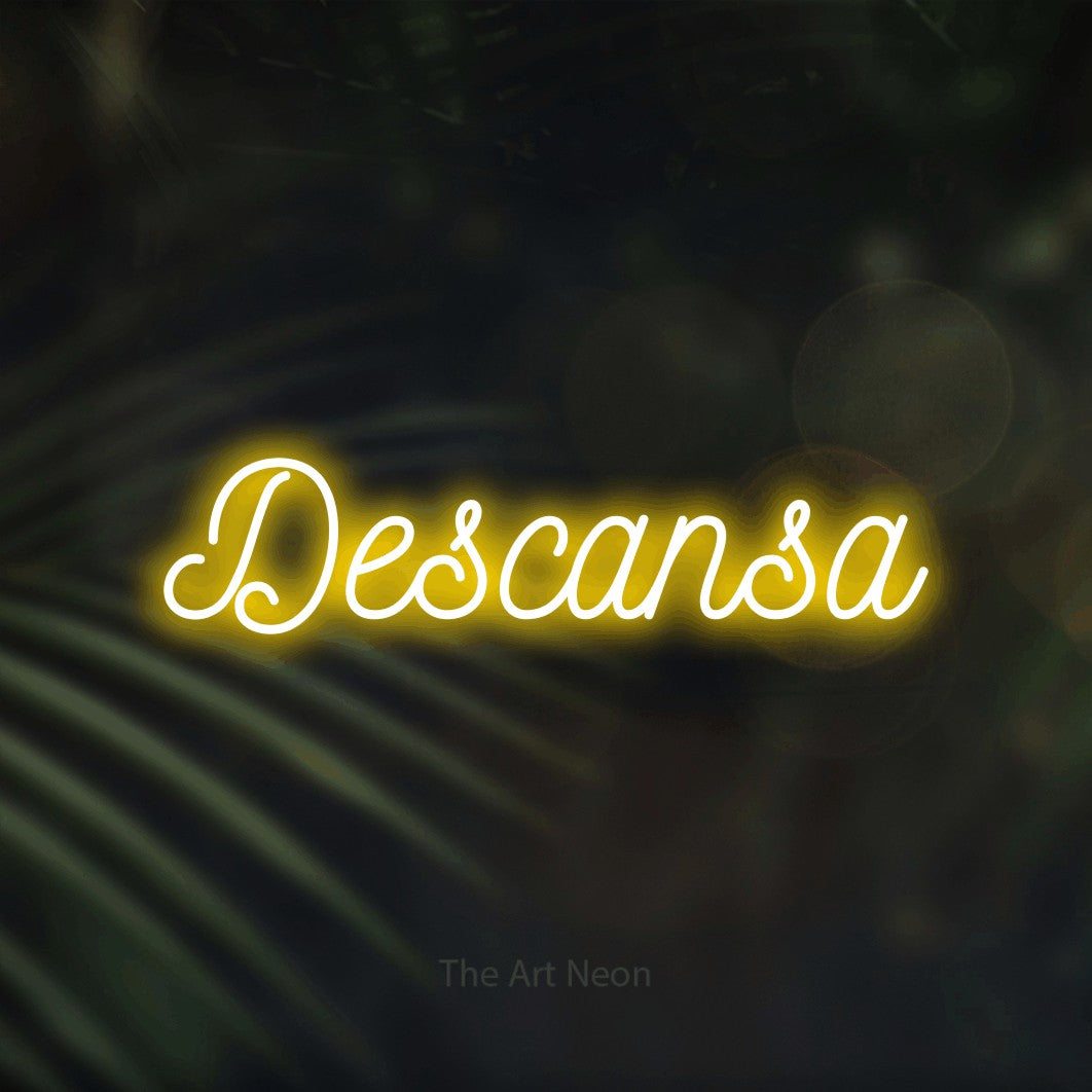 LED neon sign reading “Descansa”, arranged in a single line.