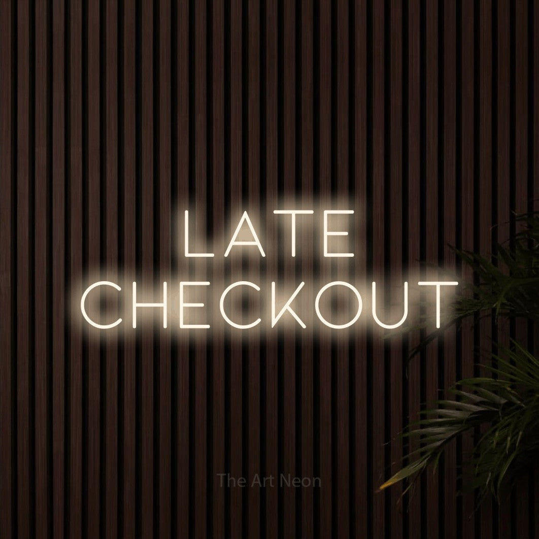 LED neon sign reading “Late Checkout”, arranged in 2 lines.
