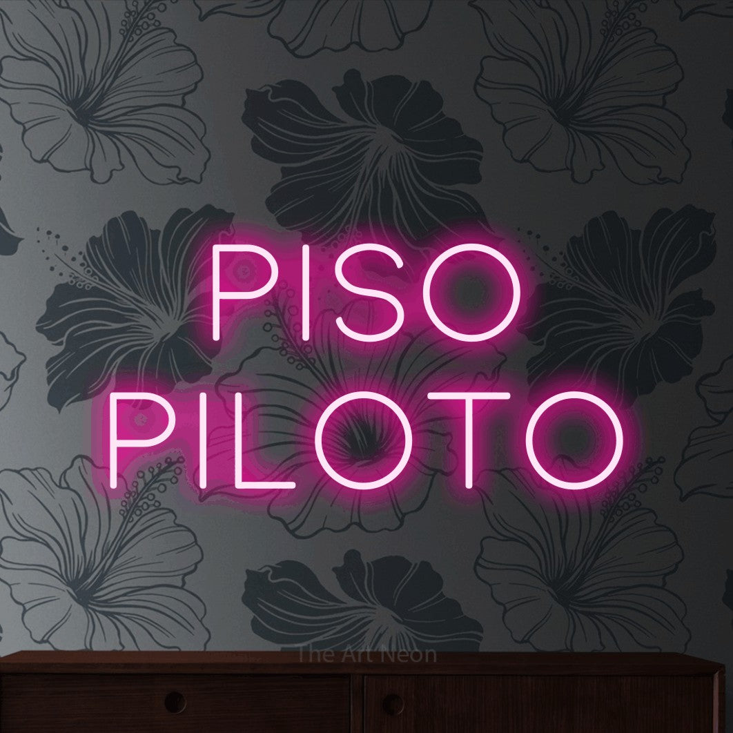 LED neon sign reading “piso piloto”, arranged in 2 lines.