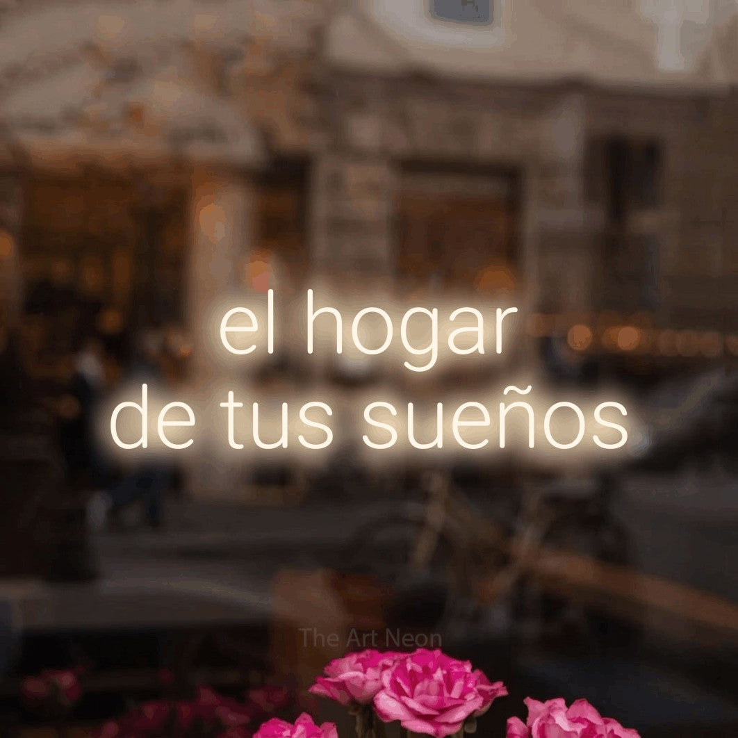 LED neon sign reading “el hogar de tus sueños”, arranged in 2 lines.