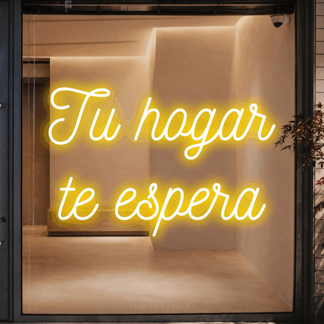 LED neon sign reading “Tu hogar te espera”, arranged in 2 lines.
