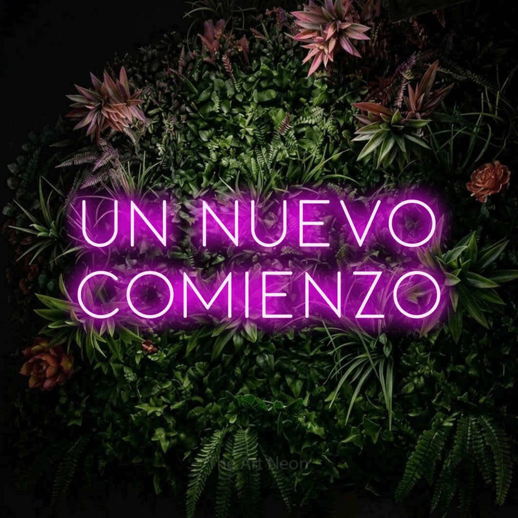 LED neon sign reading “Un Nuevo Comienzo”, arranged in 2 lines.