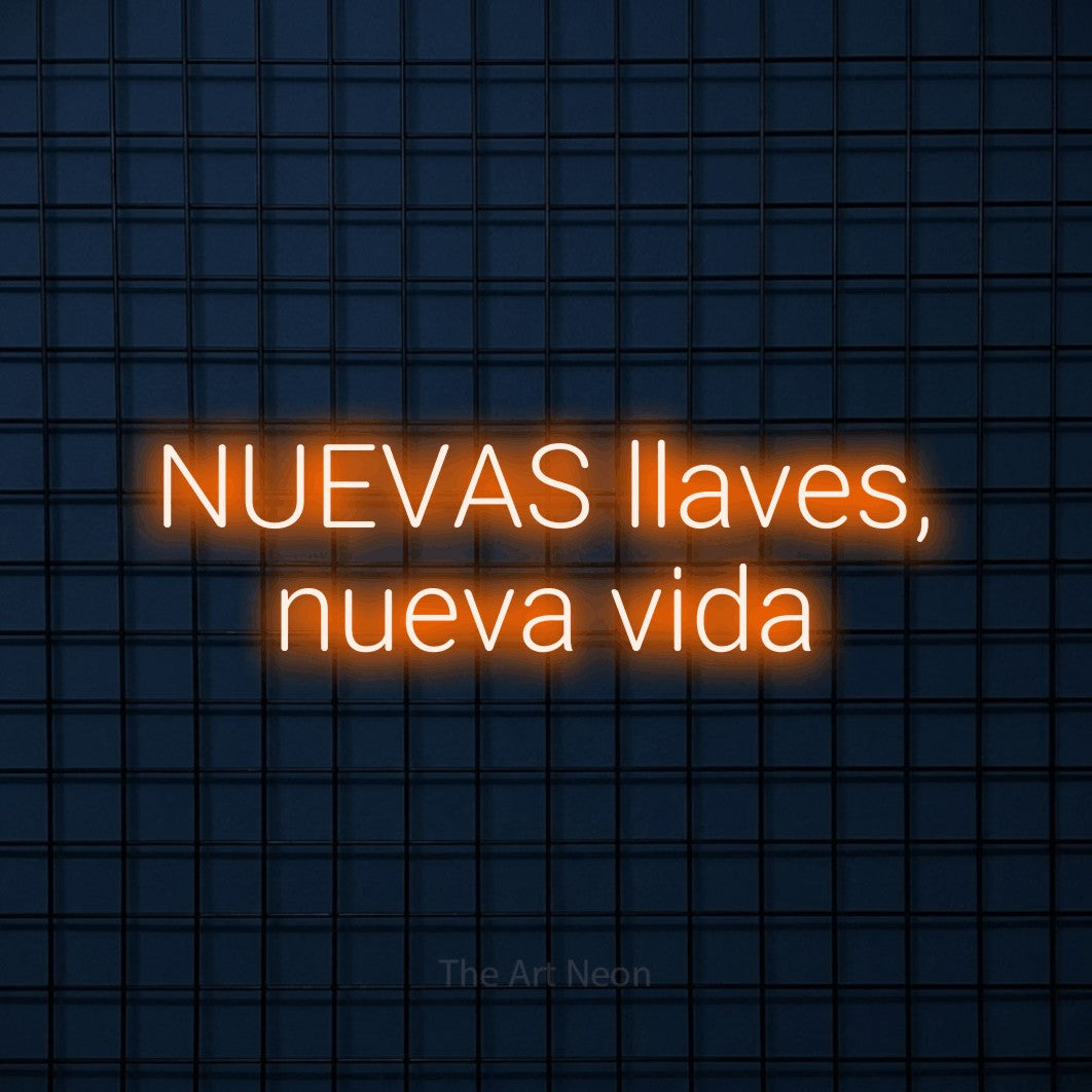 LED neon sign reading “NUEVAS llaves, nueva vida”, arranged in 2 lines.