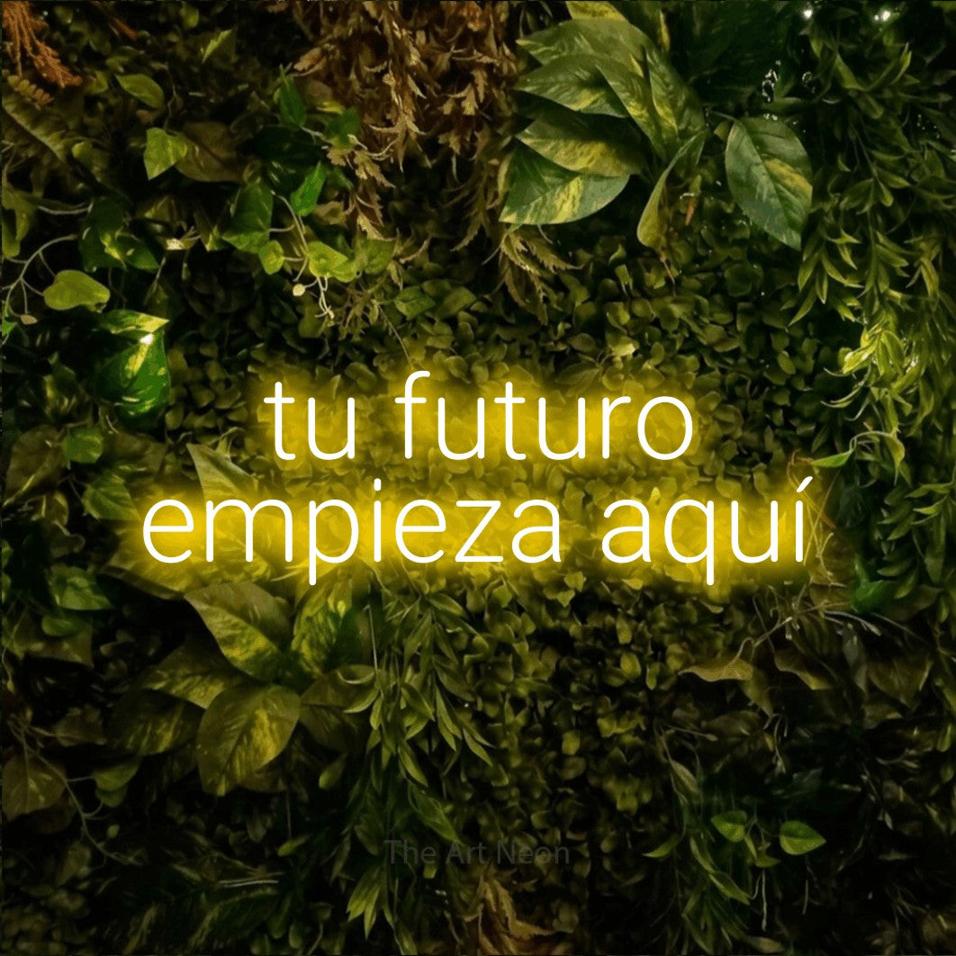 LED neon sign reading “tu futuro empieza aquí”, arranged in 2 lines.
