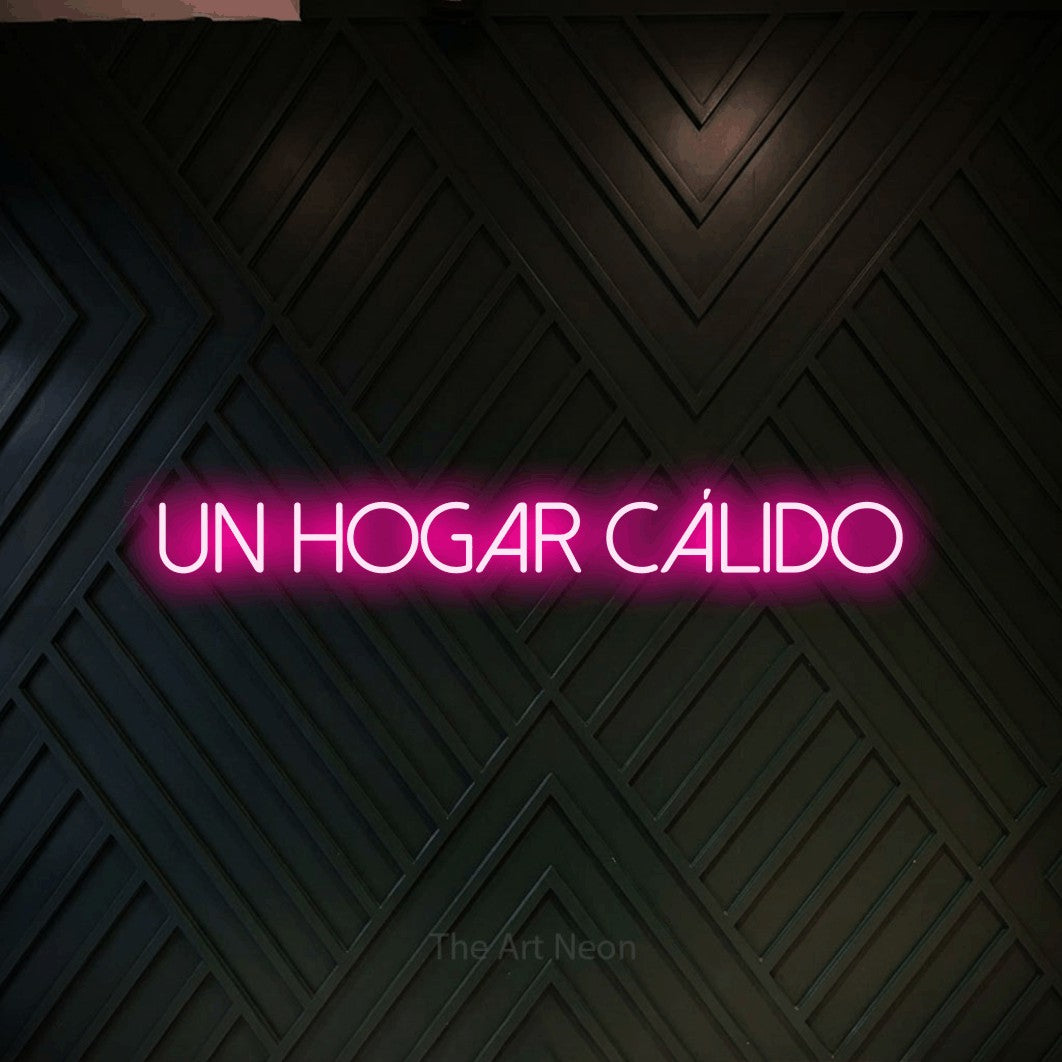 LED neon sign reading “un hogar cálido”, arranged in a single line.