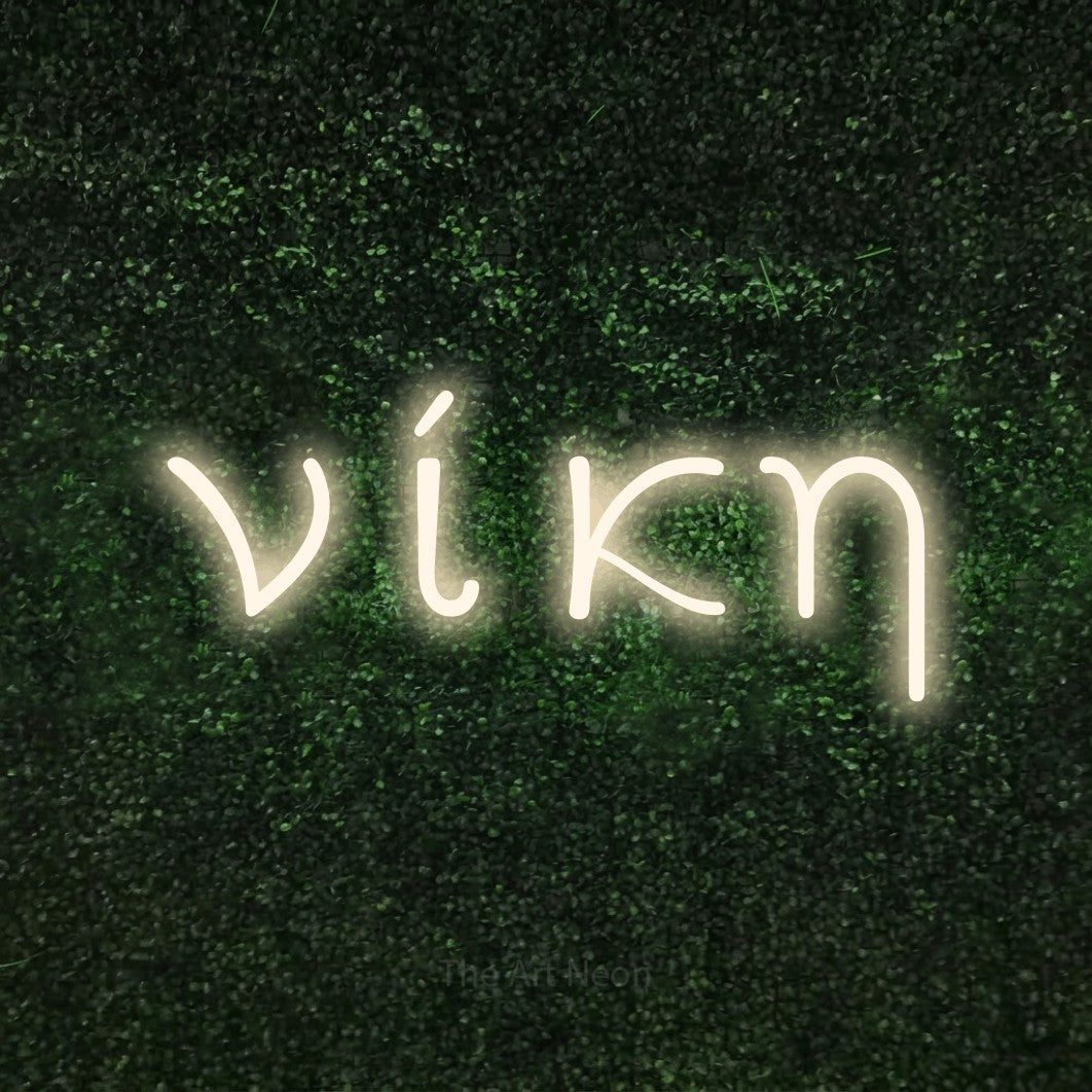 LED neon sign reading “νίκη”, arranged in a single line.