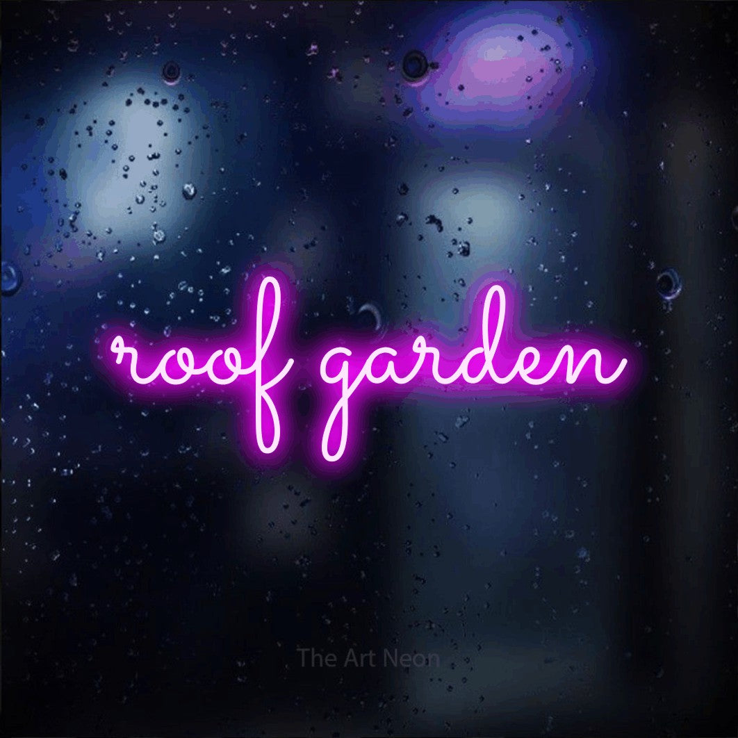 LED neon sign reading “roof garden”, arranged in a single line.