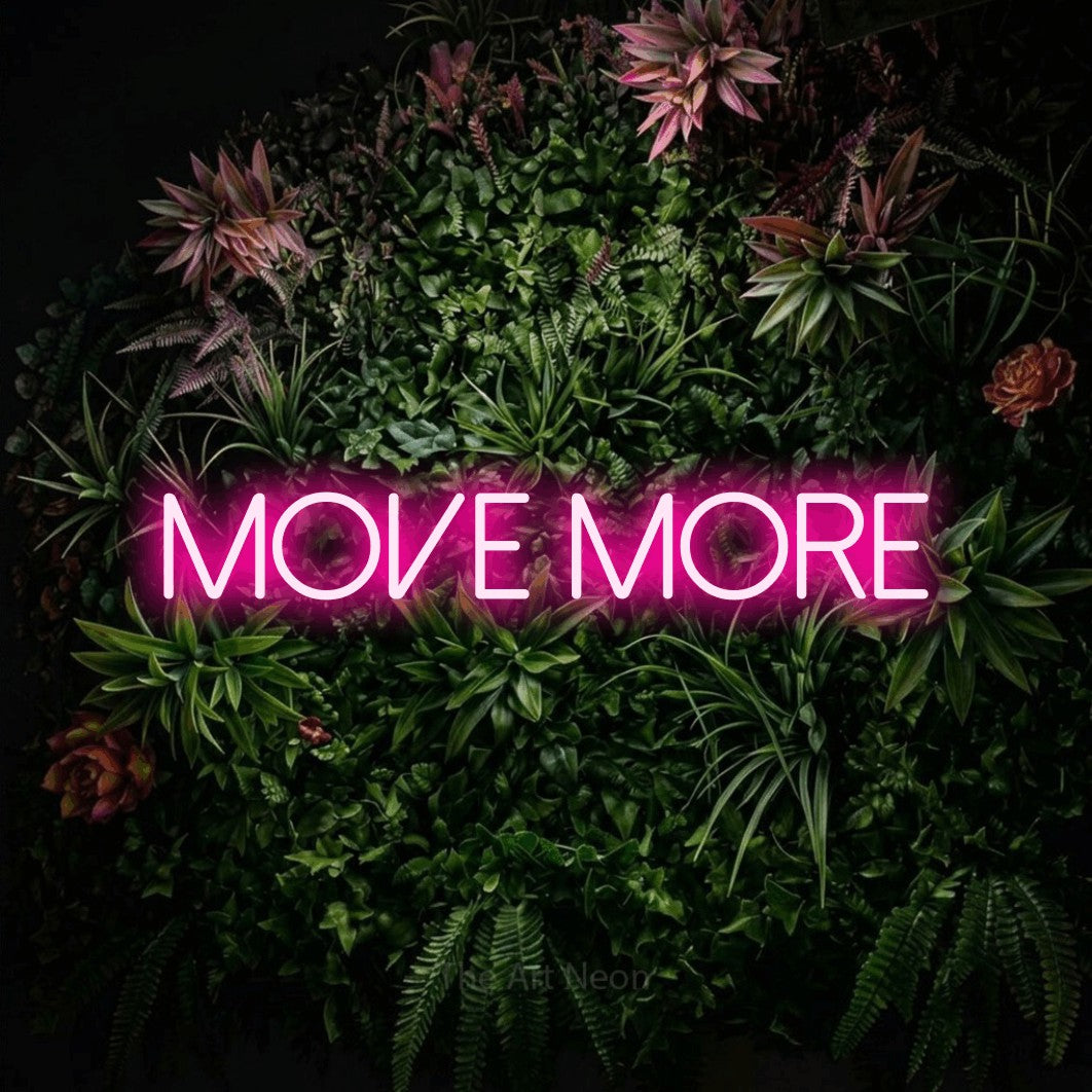LED neon sign reading “move more”, arranged in a single line.