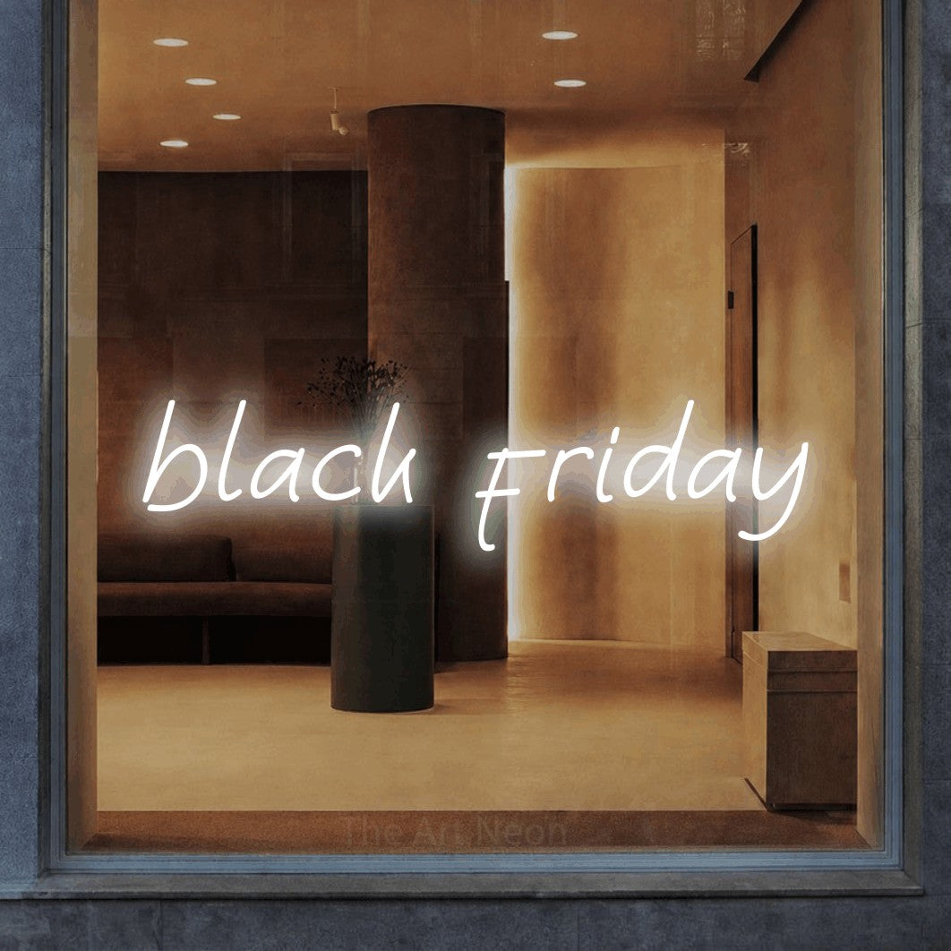 LED neon sign reading “black friday”, arranged in a single line.