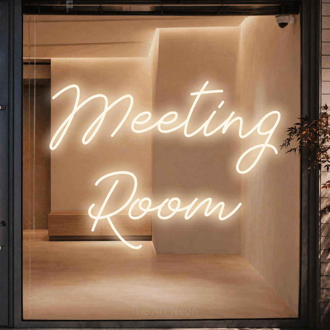 LED neon sign reading “Meeting Room”, arranged in two lines.