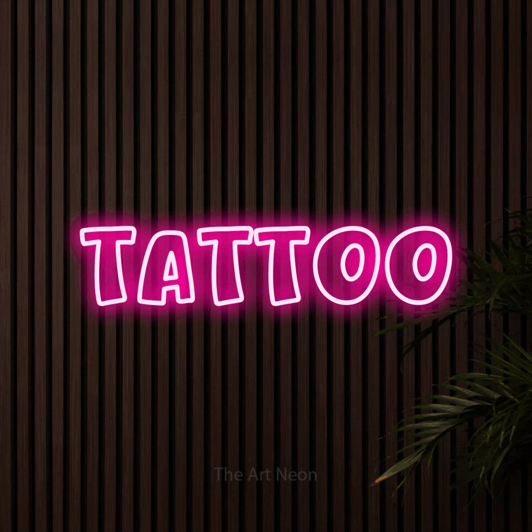 LED neon sign reading “Tattoo”, arranged in a single line.