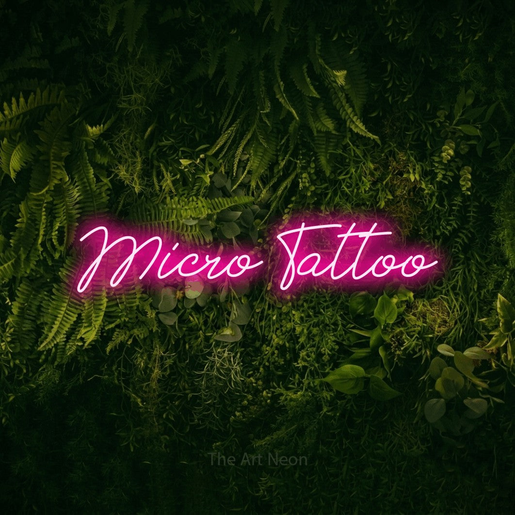 LED neon sign reading “Micro Tattoo”, arranged in a single line.